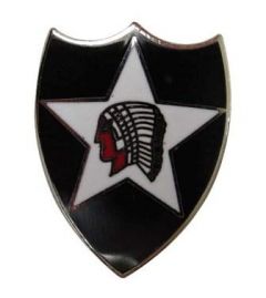Front view of shield shaped enamel 2nd Infantry Pin Badge with black background, a white star, and a red Indian head with feather headdress in the middle of the white star