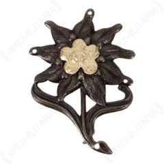 WW2 German Gebirgsjager Darkened Edelweiss Field Cap Badge With Prongs