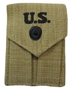 Front view of khaki M1923 Colt Ammo Pouch with black popper style button closure and U.S. stamped on the top in black