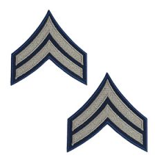 Dark blue Corporal Rank Badge with silver detail