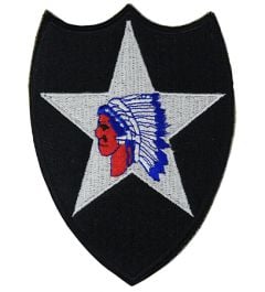 Black shield shaped insignia with white star and Indian head in the middle - 2nd Infantry Division