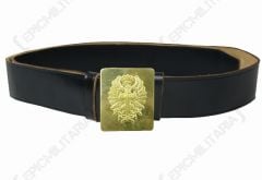 Front of dark brown leather belt with gold belt buckle