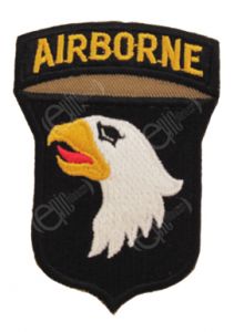 Shield shaped dark brown embroidered patch with right-facing eagle head, white with black eye, yellow beak, and red tongue. Attached to the top of the shield is a dark brown arch with AIRBORNE in golden yellow