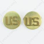 Front of pair of round, gold American EM Collar Discs both with U.S. in the middle