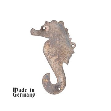 This view shows the front of the U-97 U-boat cap badge. It depicts a seahorse. -TN