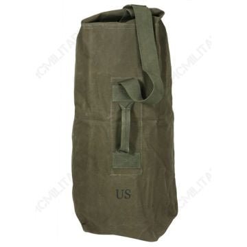 Front of olive green US Army upright duffel bag with green canvas strap and handle. US stamped underneath the handle.