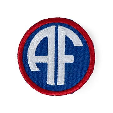 This view shows the front of the badge. Thumb.