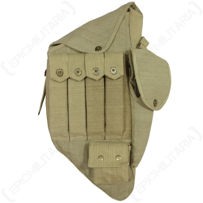 Front view of khaki canvas Thompson M1928A1 SMG Carry Case, showing 4 vertical pouches with brass popper-style buttons, a side pouch, top pout, and bottom pouch, all with the same brass popper-style buttons
