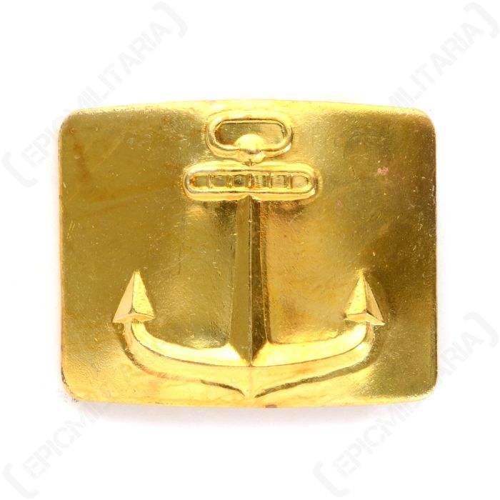 Front view of gold coloured, rectangular belt buckle with anchor detail in the middle