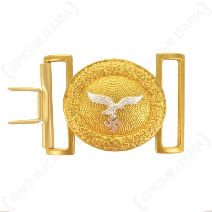 Front view of oval-shaped gold belt buckle with silver eagle in the middle
