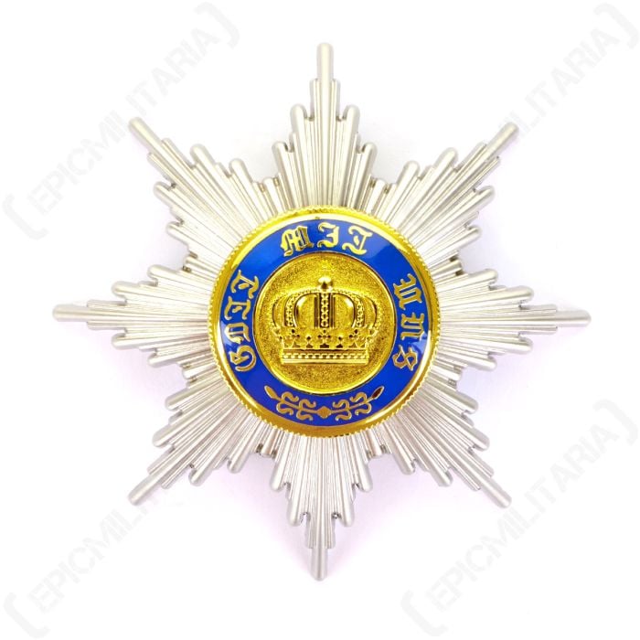 Front view of silver coloured star badge with gold and blue middle