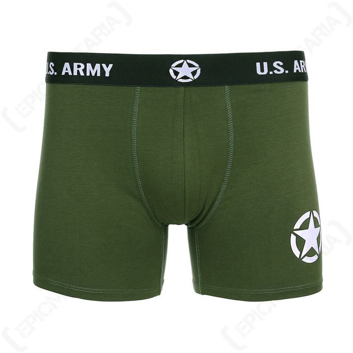 Front of green boxer shorts with black waist band and white star detail on right leg and waistband