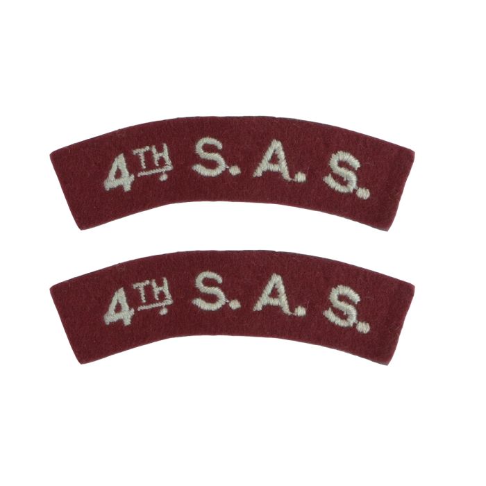 A front view of a pair of WW2 4th SAS Shoulder Titles.