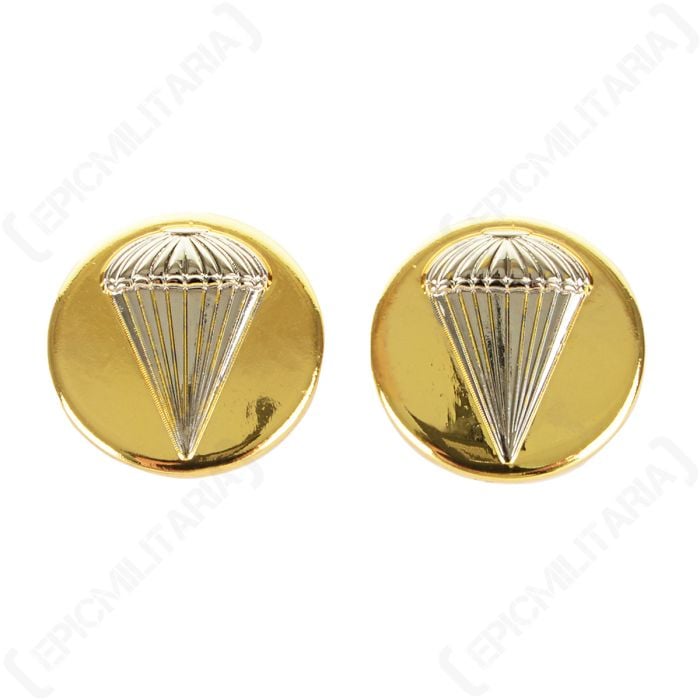 Pair of gold-coloured discs with a silver parachute detail on each