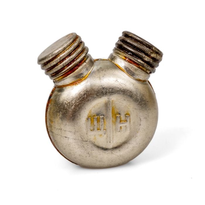 Image shows the Classic Post-war USSR Soviet Army Weapon Oiler Bottle - Front of oiler bottle. Has a щ and a H on the front.