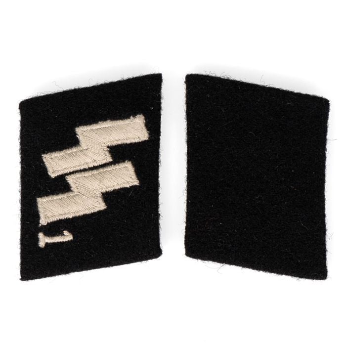 WW2 German Enlisted Man SS1 Collar Tabs - front view. Shows the silver embroidery on a wool backing.