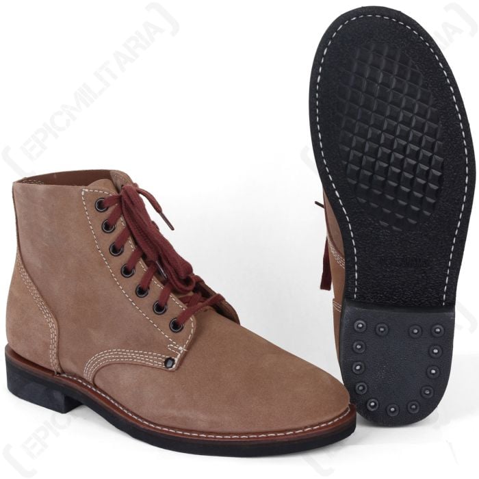 Pair of brown rough out ankle boots with red-brown laces. One boot is facing left and the other is upright showing the underneath