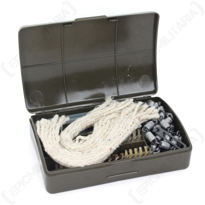 Internal shot of plastic olive drab case containing a G3 gun cleaning kit including white rope and a spiral brush
