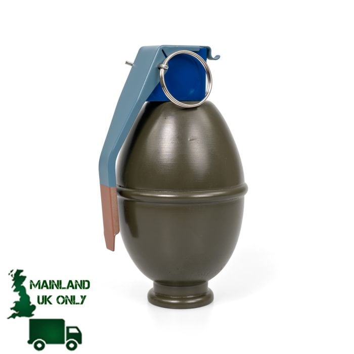 The image shows the spoon and pin of a Cold War era wooden replica of a US M61 Egg Grenade.
