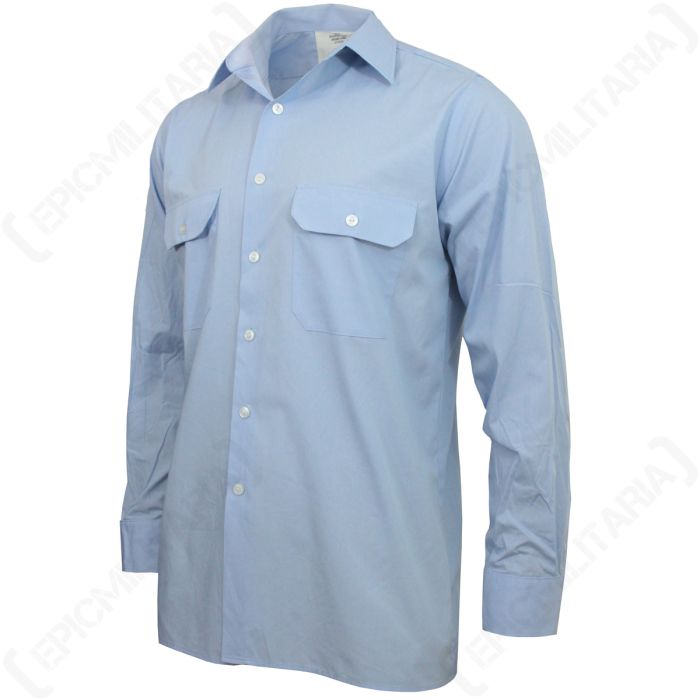 Front view of light blue long-sleeved shirt with two chest pockets, turned slightly to the left