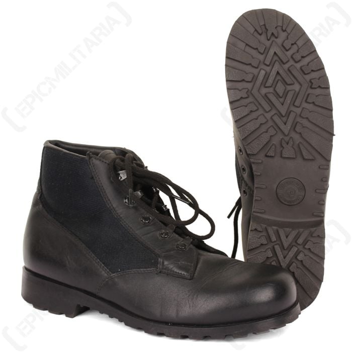 Side view of pair of leather and fabric ankle boots with black laces