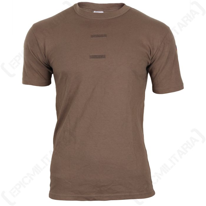 Front view of brown crew-neck t-shirt with two strips of hook and loop material on the chest. The t-shirt is on a white background.