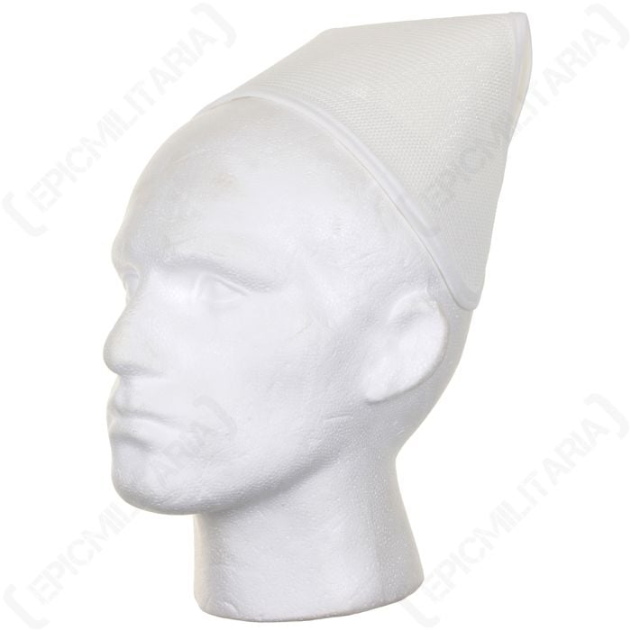 Plain white nurses cap on top of the head of a white polystyrene mannequin