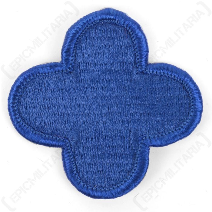 Front view of blue, embroidered, cloverleaf-shaped patch