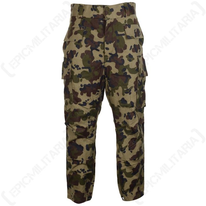 Front view of a pair of cargo-style trousers featuring Romanian Army camo, which is a light sage green base with green and brown leaf-like shapes randomly layered on top. There is a cargo-style pocket on each leg, as well as a large pocket on each side ne