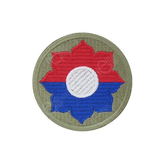Circular khaki green embroidered insignia with red and blue flower in the middle - 9th Infantry Division