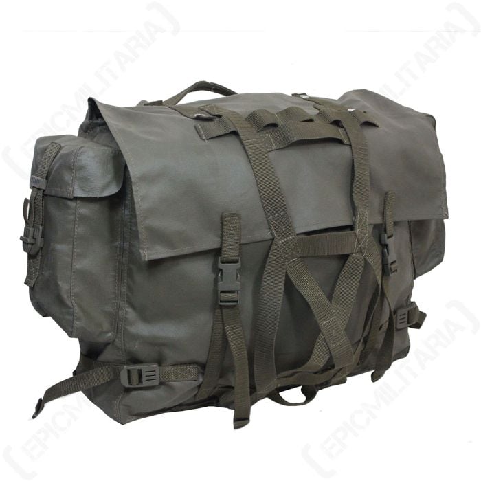 Front side view of dark green Original Swiss Army Rucksack with side pouches, multiple canvas straps, and plastic buckles