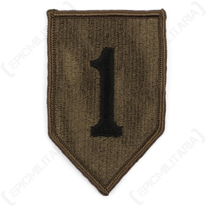 Olive green shield-shaped embroidered patch with a black 1 in the middle