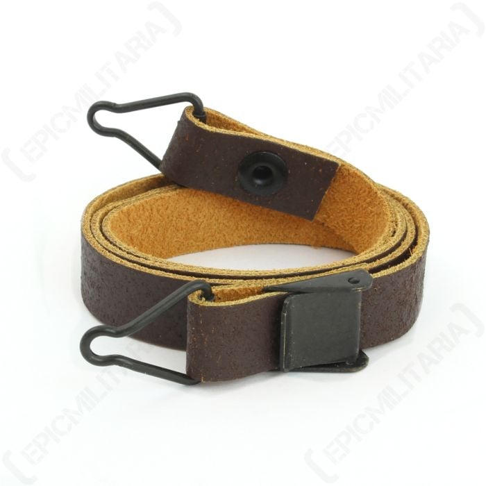 Rolled up brown leather US M1 1944 Pattern Chin Strap with grey buckle