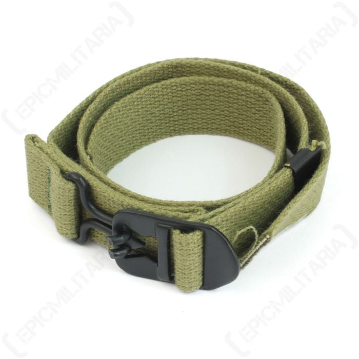 Rolled up green canvas US M1 Helmet Chin Strap - 1942 Pattern with black buckle