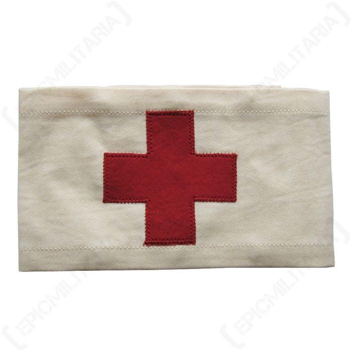 Front of off-white canvas US Medic Armband with red cross in the middle